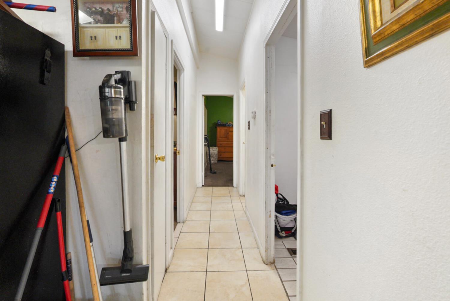 4837 Faith Home Road, Unit 102 Ceres, CA 95307 - Photo 15 of 16 a view of walk in closet with clothes