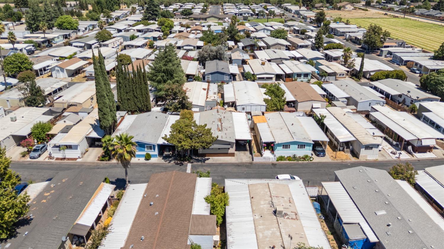 4837 Faith Home Road, Unit 102 Ceres, CA 95307 - Photo 4 of 16 an aerial view of residential houses with yard