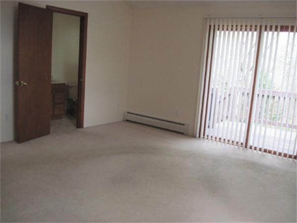 23 Locke Road Rutland, MA 01543 - Photo 4 of 7 an empty room with windows