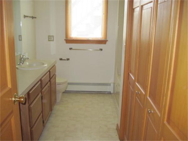 23 Locke Road Rutland, MA 01543 - Photo 5 of 7 a bathroom with a granite countertop sink and a mirror