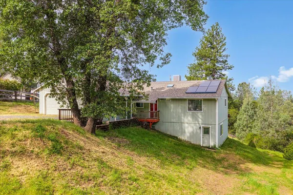 a aerial view of a house with a garden