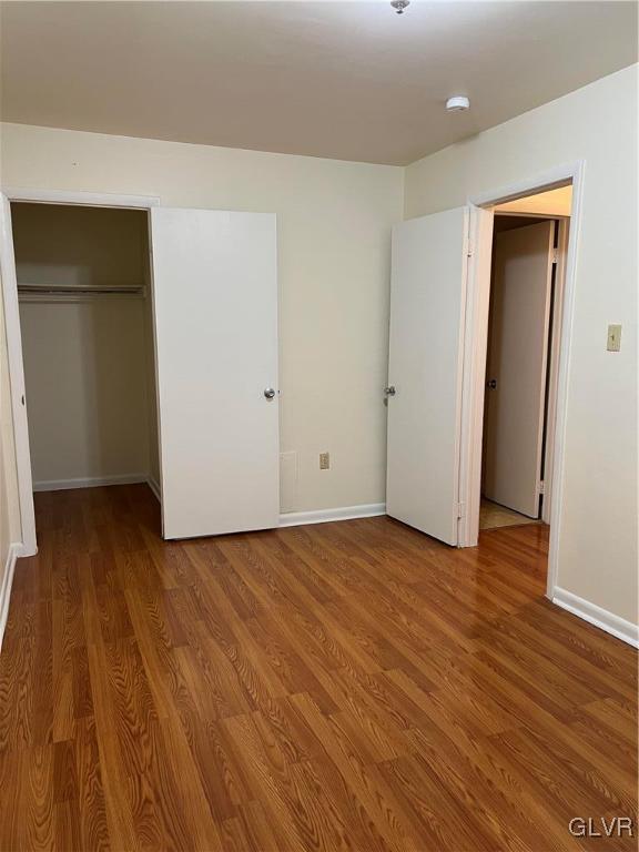 1538 East 8th Street, Unit C Bethlehem, PA 18015 - Photo 11 of 18 a view of an empty room with wooden floor and closet