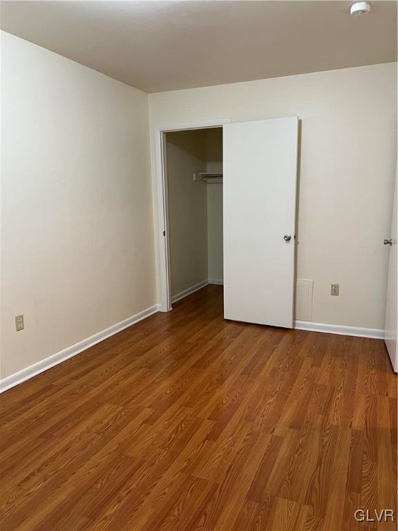 1538 East 8th Street, Unit C Bethlehem, PA 18015 - Photo 12 of 18 a view of an empty room with wooden floor