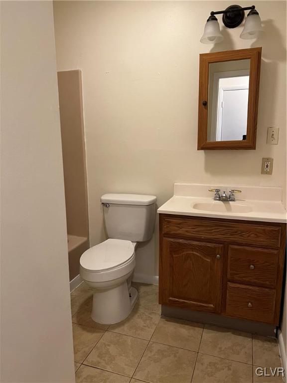 1538 East 8th Street, Unit C Bethlehem, PA 18015 - Photo 17 of 18 a bathroom with a toilet sink and mirror