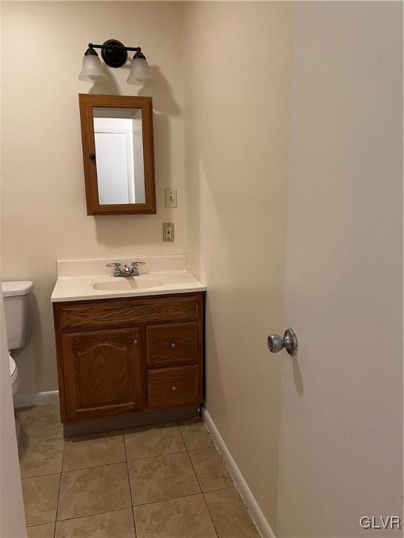 1538 East 8th Street, Unit C Bethlehem, PA 18015 - Photo 18 of 18 a bathroom with a sink and a mirror
