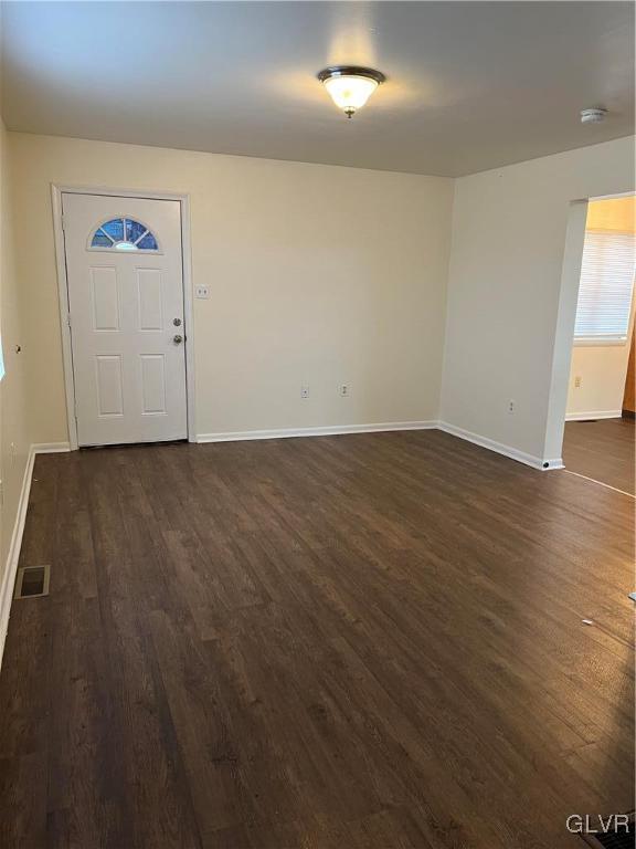 1538 East 8th Street, Unit C Bethlehem, PA 18015 - Photo 2 of 18 an empty room with wooden floor and windows