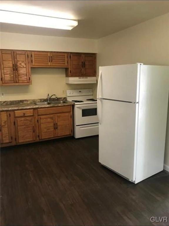1538 East 8th Street, Unit C Bethlehem, PA 18015 - Photo 8 of 18 a kitchen with stainless steel appliances granite countertop a refrigerator a stove and a sink