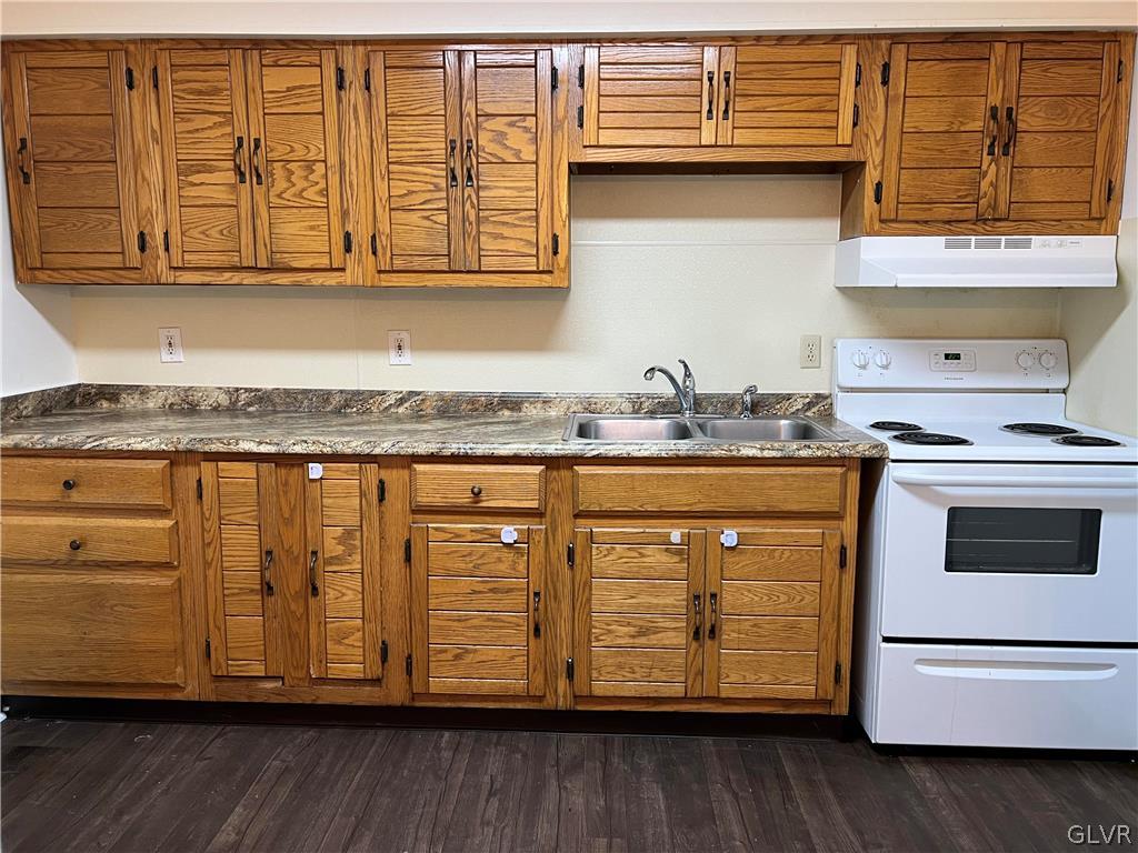 1538 East 8th Street, Unit C Bethlehem, PA 18015 - Photo 9 of 18 a kitchen with stainless steel appliances granite countertop a sink a stove and cabinets