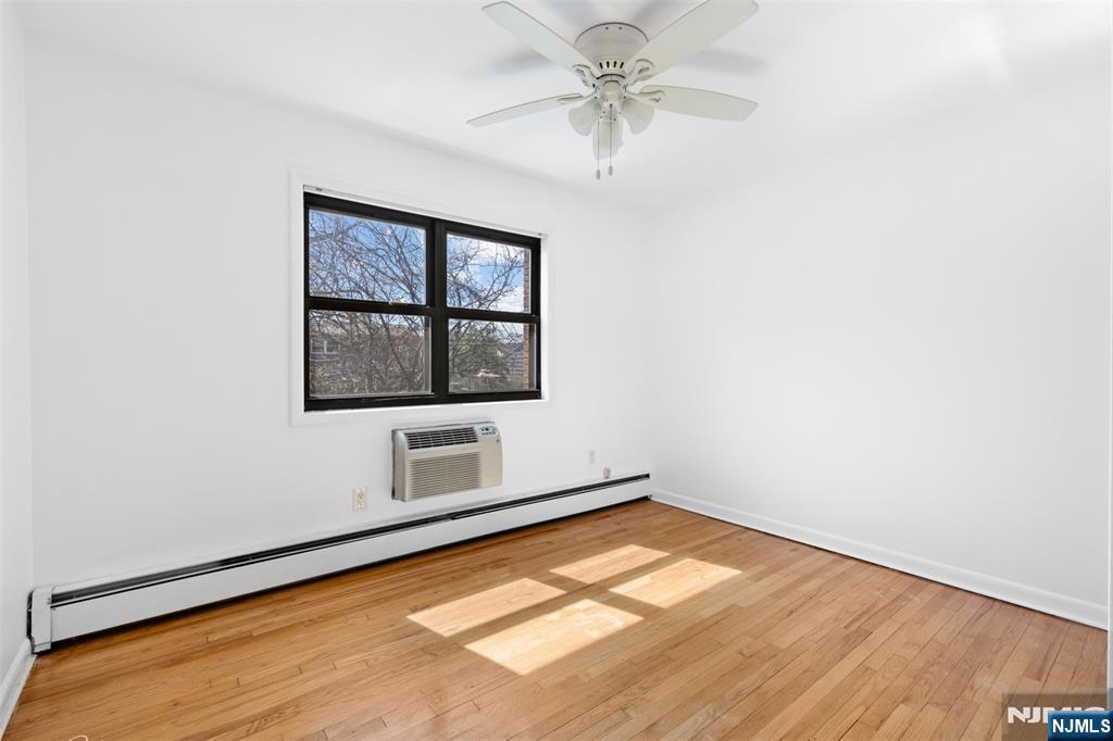6 Colonial Drive, Unit 6A Little Falls, NJ 07424 - Photo 12 of 44 an empty room with a window