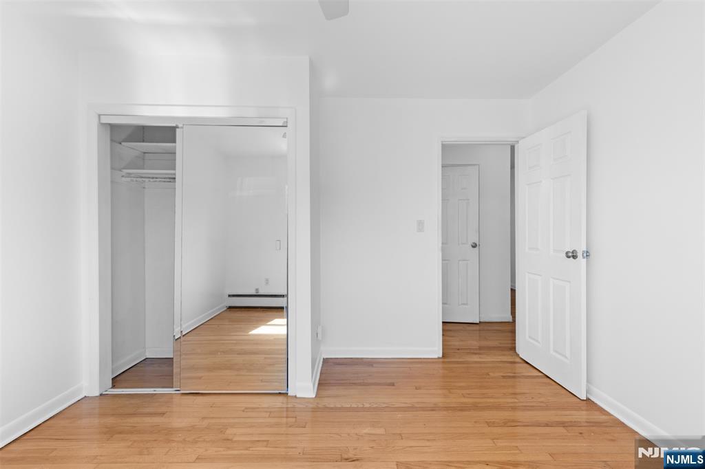 6 Colonial Drive, Unit 6A Little Falls, NJ 07424 - Photo 16 of 44 a view of entryway with wooden floor