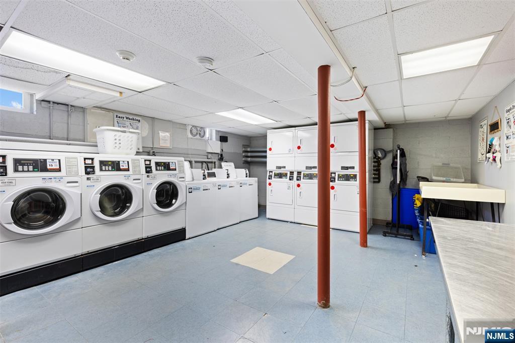 6 Colonial Drive, Unit 6A Little Falls, NJ 07424 - Photo 23 of 44 a utility room with dryer and washer