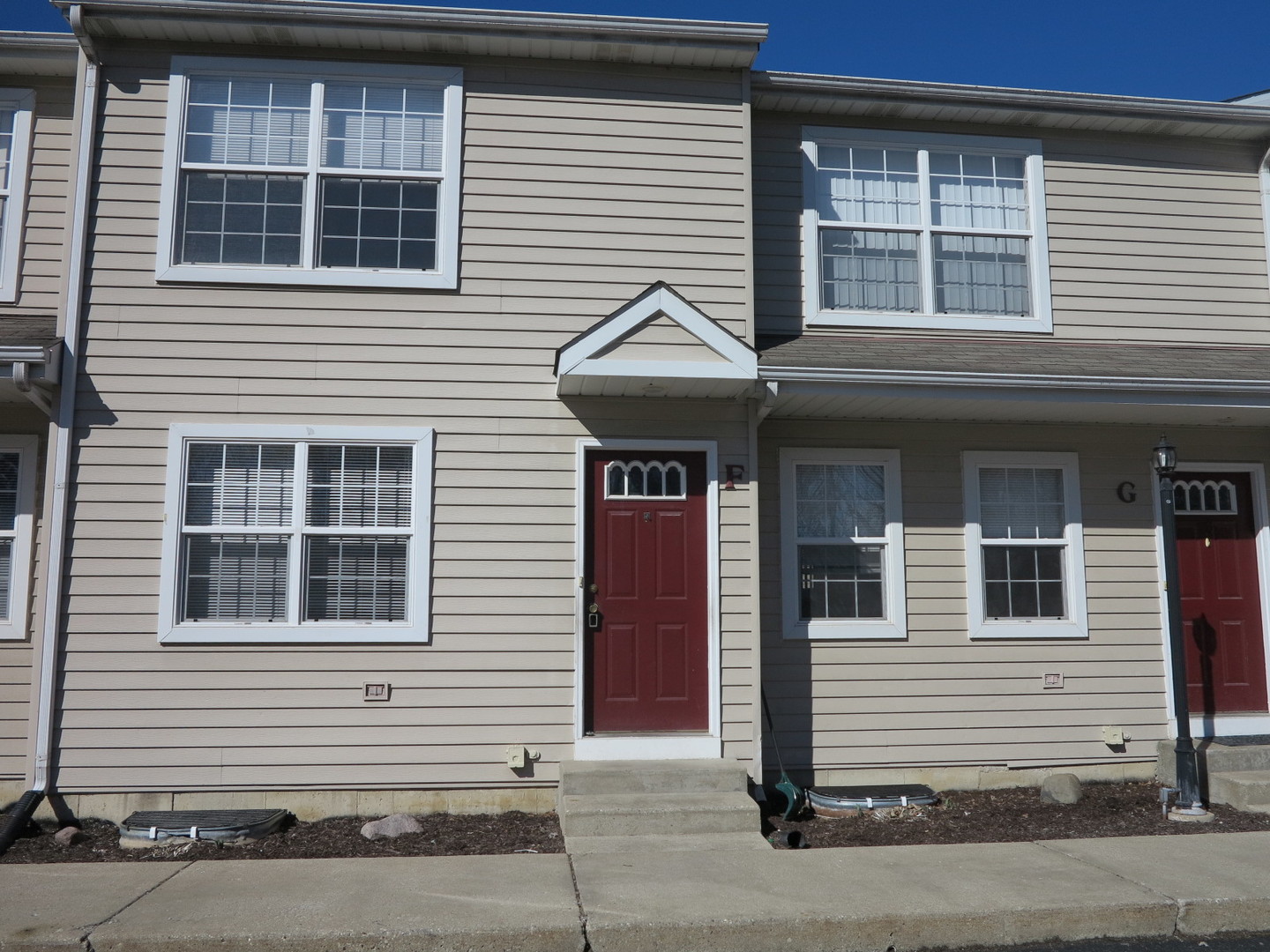667 West Liberty Street, Unit F Wauconda, IL 60084 - Photo 1 of 4 a front view of a house