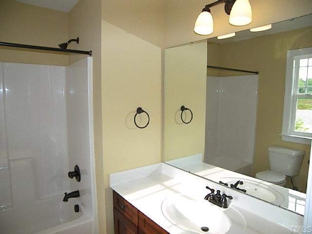 3507 Provost Street Raleigh, NC 27603 - Photo 11 of 12 This is the Austen Plan Model second bath with upgrades that include: upgrade cabinets, bronze fixtures and tile flooring.