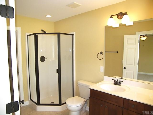 3507 Provost Street Raleigh, NC 27603 - Photo 9 of 12 This is the Austen Plan Model Master bath with upgrades that include: upgrade cabinets, bronze fixtures and tile flooring.