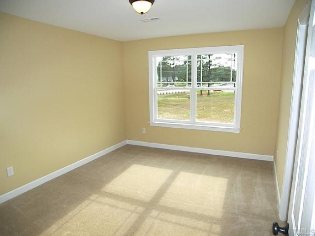 3507 Provost Street Raleigh, NC 27603 - Photo 10 of 12 This is the Austen Plan Model second bedroom. Upgrade include: bronze ceiling fixture (Brushed Nickel is std.) and bronze hardware.