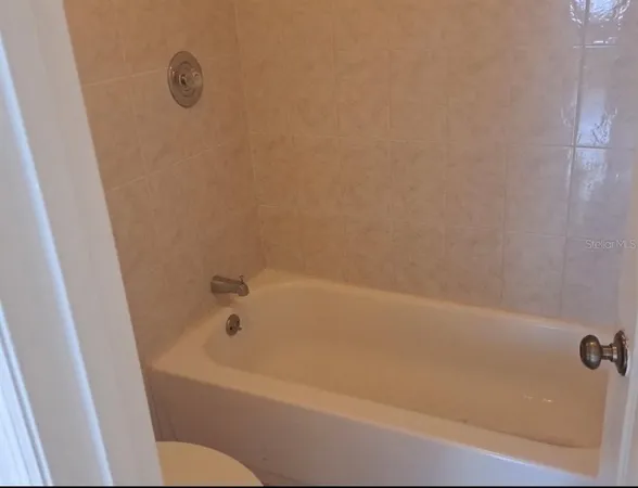 a bathroom with a bathtub