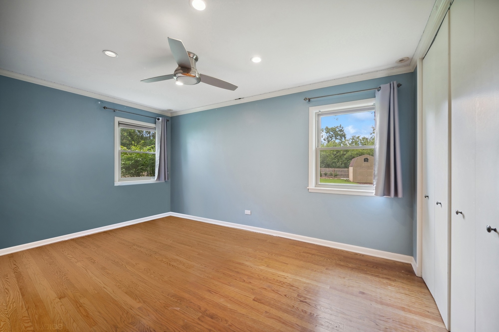 1165 West Deerpath Road Lake Forest, IL 60045 - Photo 11 of 16 a view of an empty room with a window