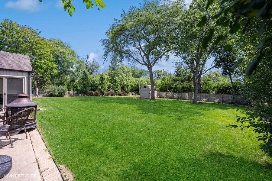 1165 West Deerpath Road Lake Forest, IL 60045 - Photo 14 of 16 a view of backyard with a garden and entertaining space