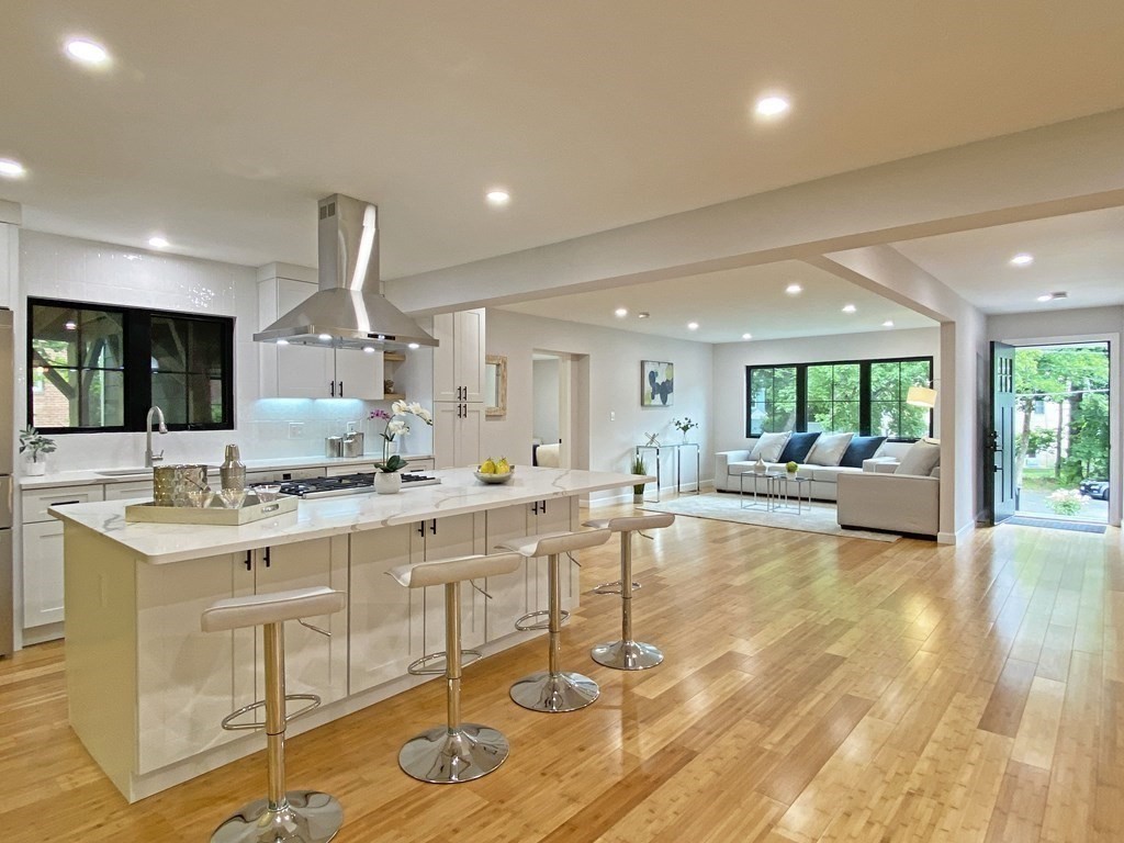 9 Glazer Road, Unit 9 Newton, MA 02459 - Photo 1 of 40 a large white kitchen with a large window