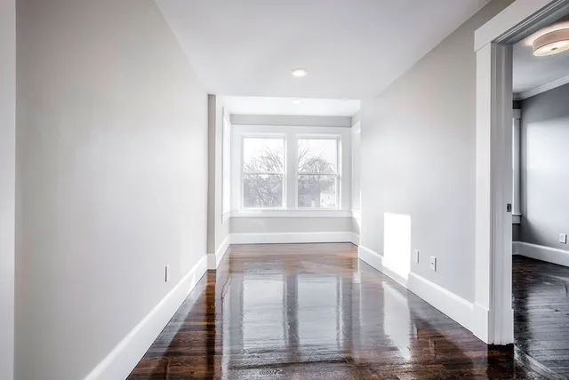 a view of entryway with livingroom