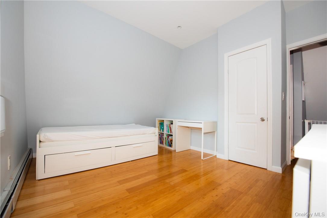 37 South Washington Avenue Hartsdale, NY 10530 - Photo 12 of 34 a bathroom with a bathtub and a toilet