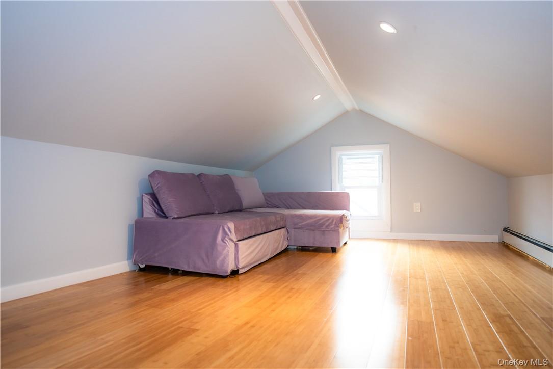 37 South Washington Avenue Hartsdale, NY 10530 - Photo 19 of 34 a living room with furniture and a couch