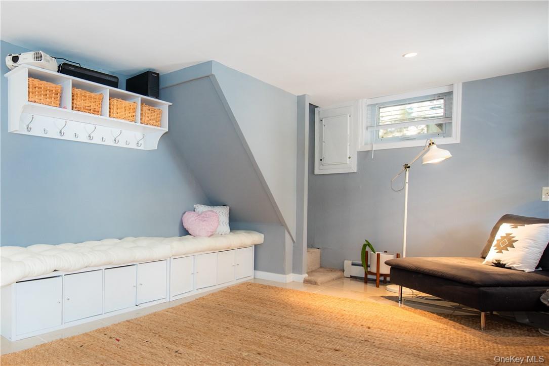 37 South Washington Avenue Hartsdale, NY 10530 - Photo 23 of 34 a bedroom with furniture and a window