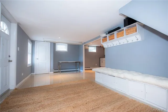 a view of livingroom with furniture and staircase