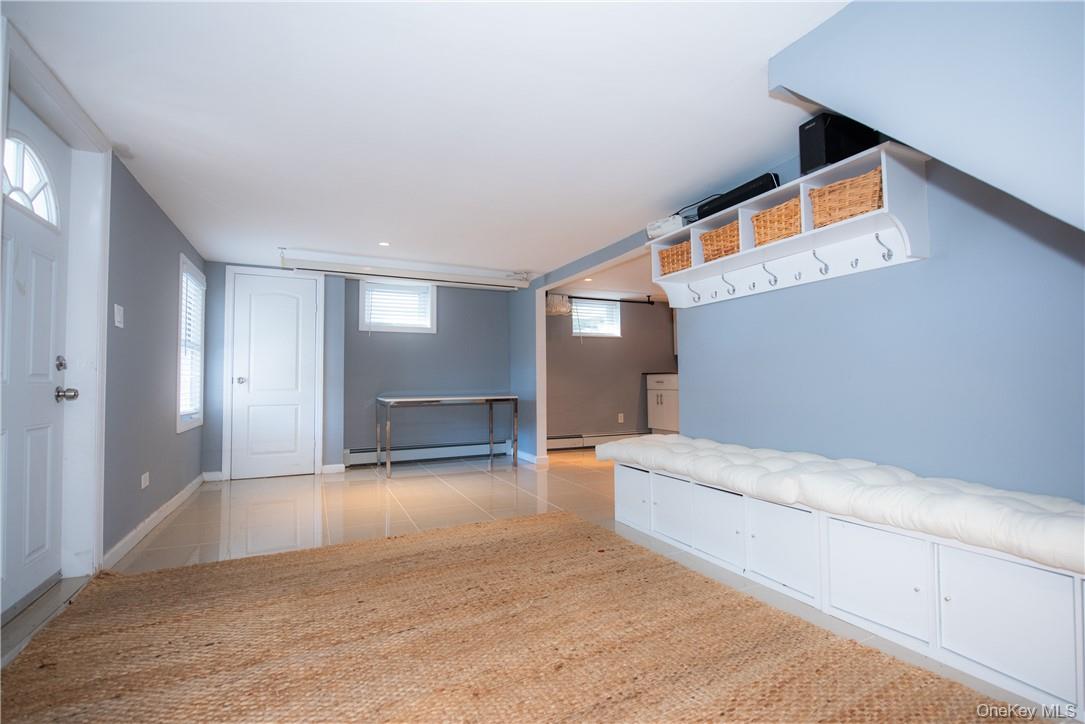 37 South Washington Avenue Hartsdale, NY 10530 - Photo 25 of 34 a view of livingroom with furniture and staircase