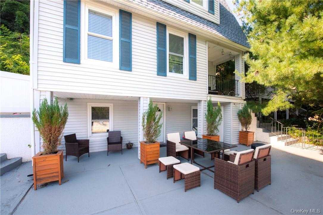 37 South Washington Avenue Hartsdale, NY 10530 - Photo 27 of 34 a view of a patio with couches and a potted plant