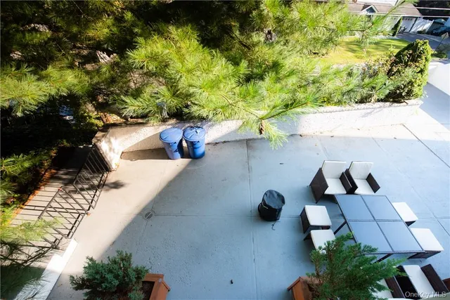 a view of swimming pool with a patio