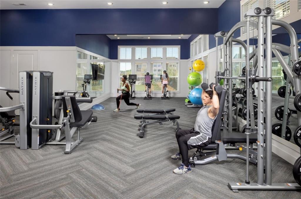 4000 Mill Spring Circle, Unit 4433 Oakwood, GA 30566 - Photo 20 of 28 a view of a room with gym equipment