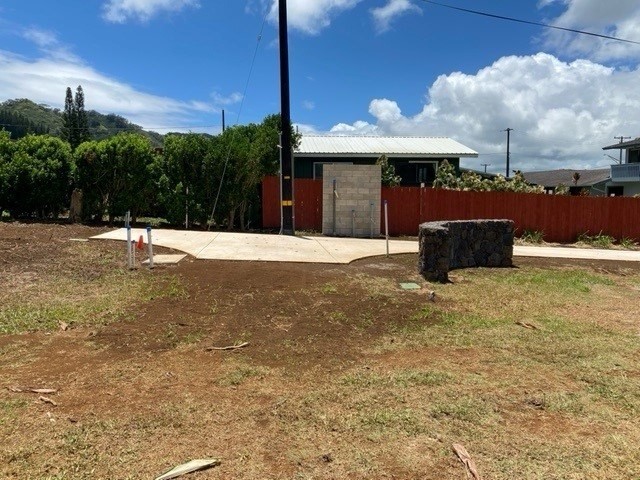 Crossley Road, Unit 2 Kapaa, HI 96746 - Photo 3 of 12 a front view of a house with a yard