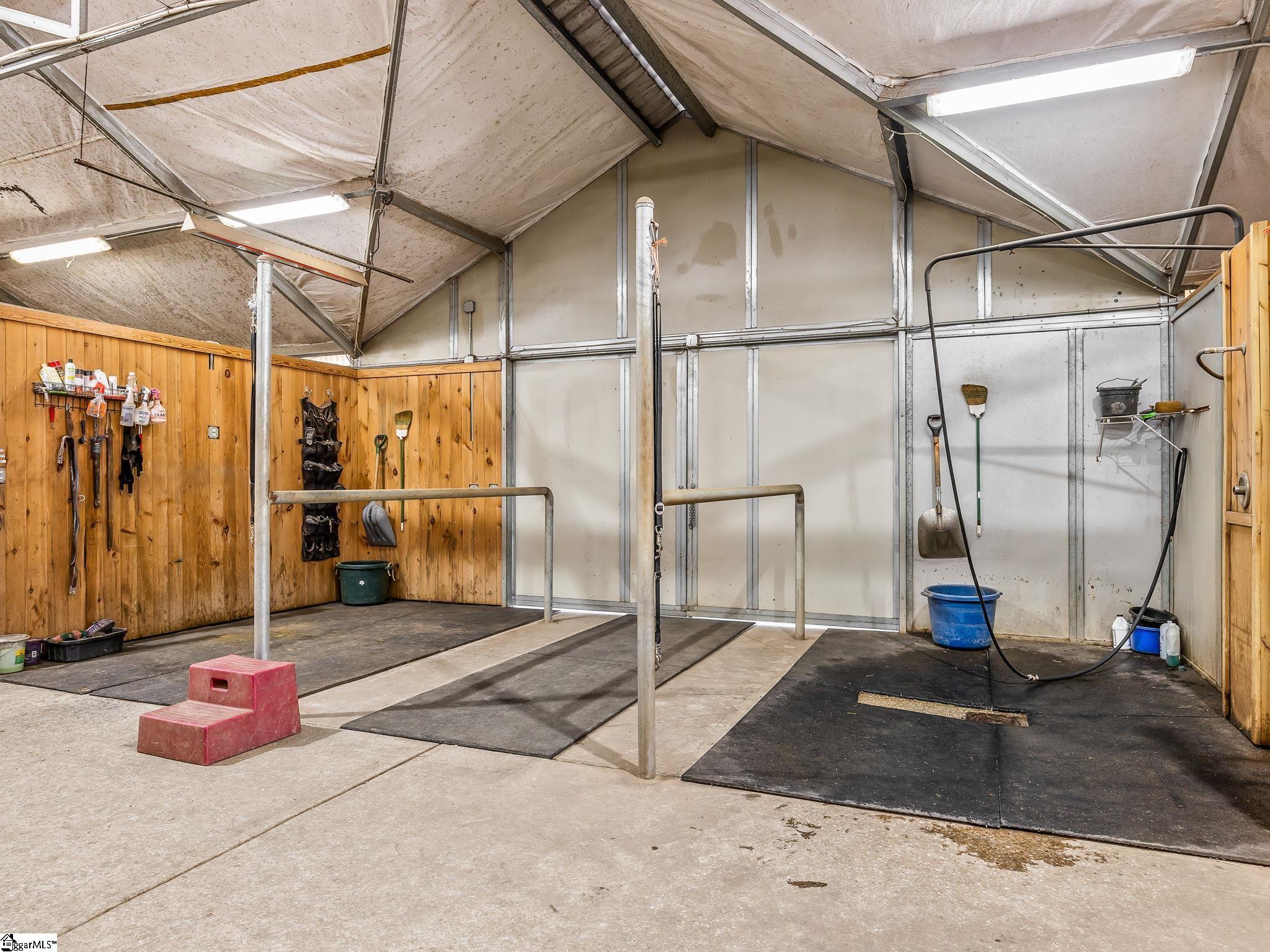 145 Dickson Road Campobello, SC 29322 - Photo 44 of 50 The second set of grooming and wash stalls in the Mian Barn.