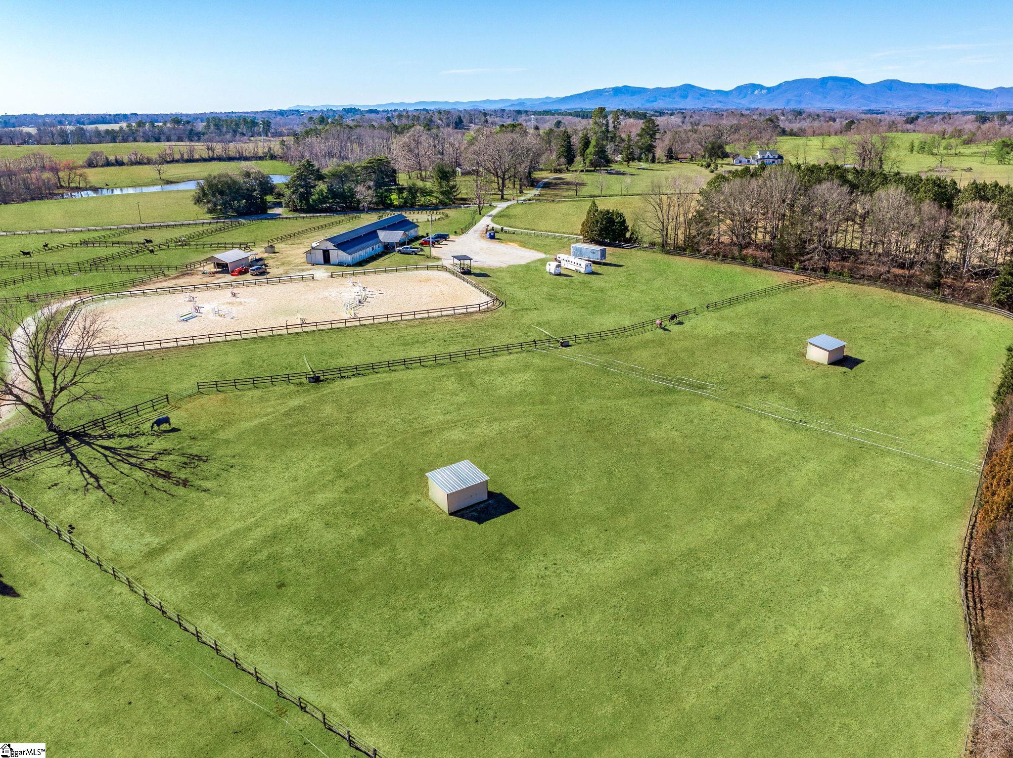 145 Dickson Road Campobello, SC 29322 - Photo 47 of 50 This is just one of the many pastures w/ run in sheds on the property. There is also additional unfenced pasture that is used as hay fields.