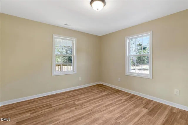 a view of a room that has a window in it