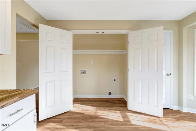a view of a livingroom with wooden floor