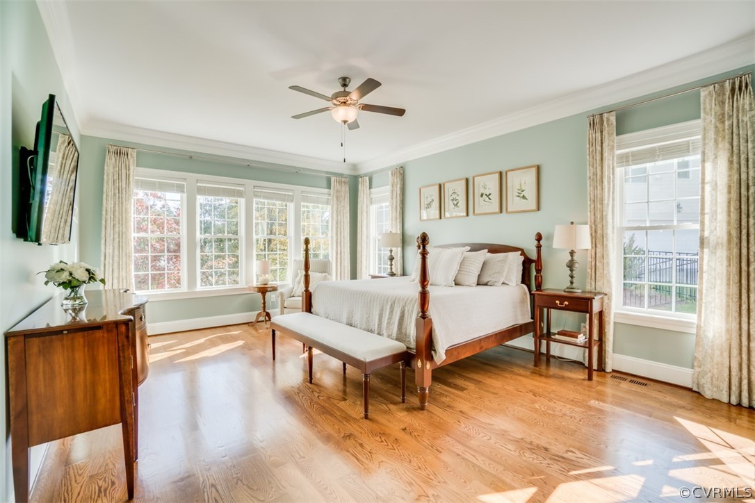 556 Raleigh Manor Road Henrico, VA 23229 - Photo 21 of 41 Main level primary bedroom is bright, sunny and of