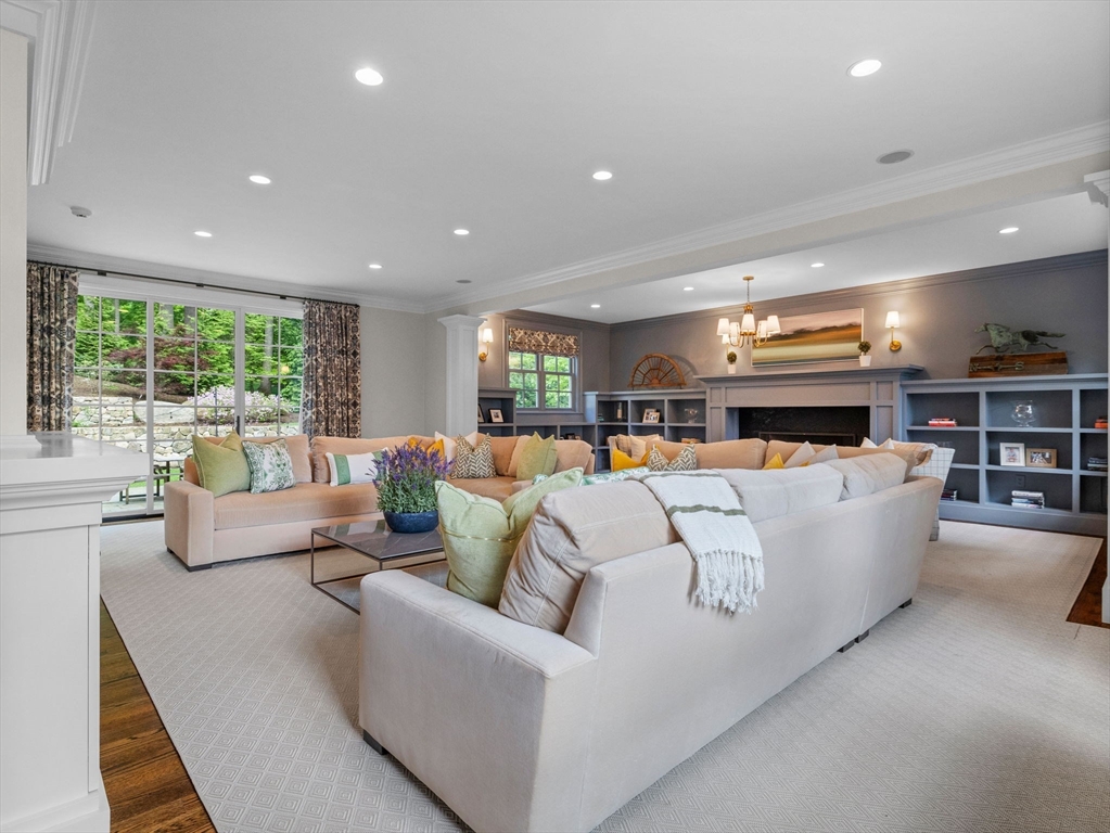 50 Temple Road Wellesley, MA 02482 - Photo 12 of 37 a living room with furniture and a large window