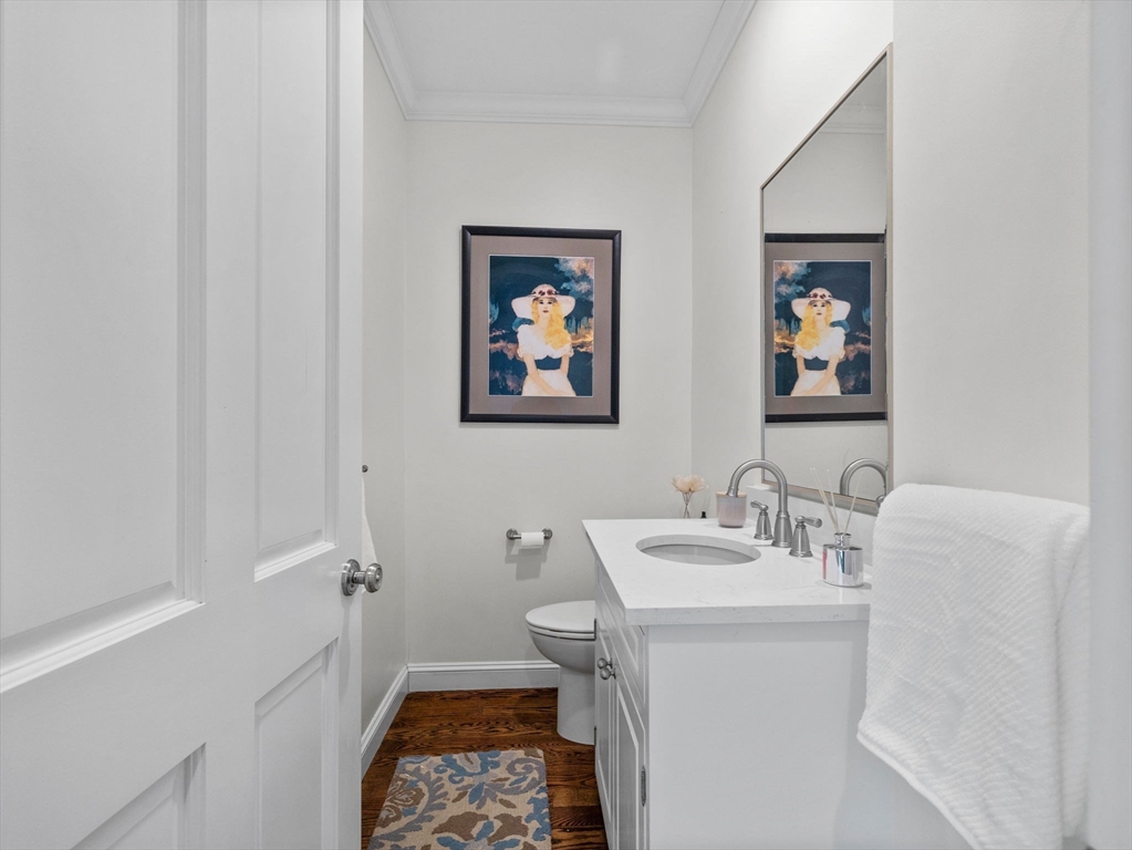 50 Temple Road Wellesley, MA 02482 - Photo 16 of 37 a bathroom with a sink and a mirror