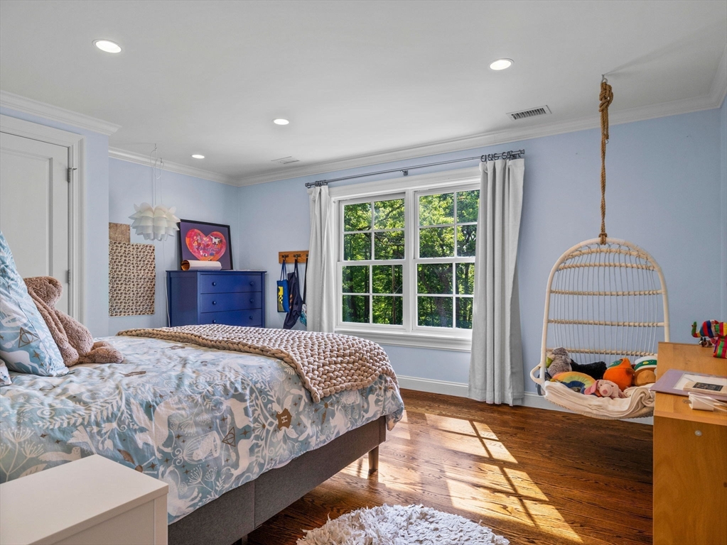 50 Temple Road Wellesley, MA 02482 - Photo 21 of 37 a bedroom with a bed and a large window