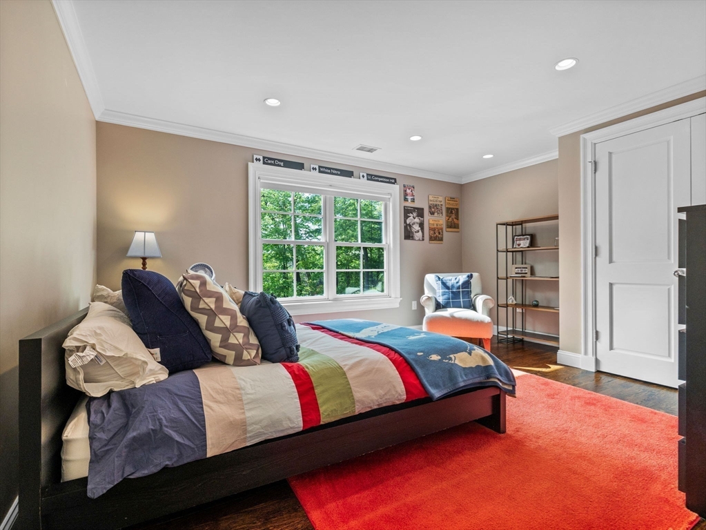 50 Temple Road Wellesley, MA 02482 - Photo 24 of 37 a bedroom with bed and window