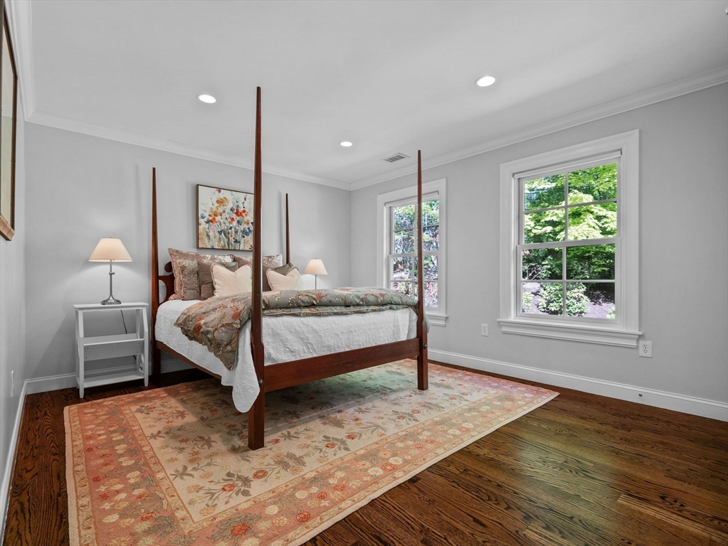 50 Temple Road Wellesley, MA 02482 - Photo 25 of 37 a bedroom with a bed lamp and window
