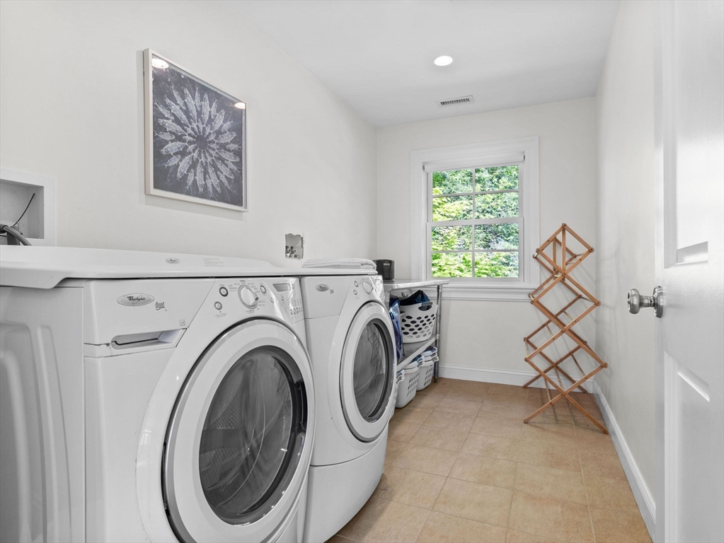 50 Temple Road Wellesley, MA 02482 - Photo 27 of 37 a view of entryway with washer and dryer