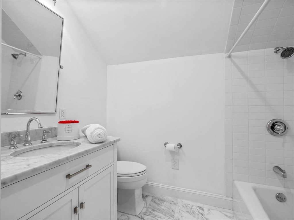 50 Temple Road Wellesley, MA 02482 - Photo 29 of 37 a bathroom with a granite countertop sink a toilet and shower