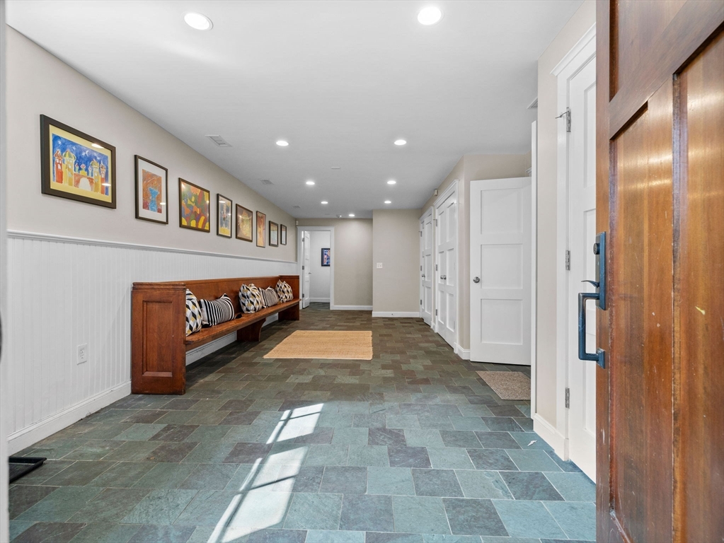 50 Temple Road Wellesley, MA 02482 - Photo 30 of 37 a view of a hallway with a livingroom