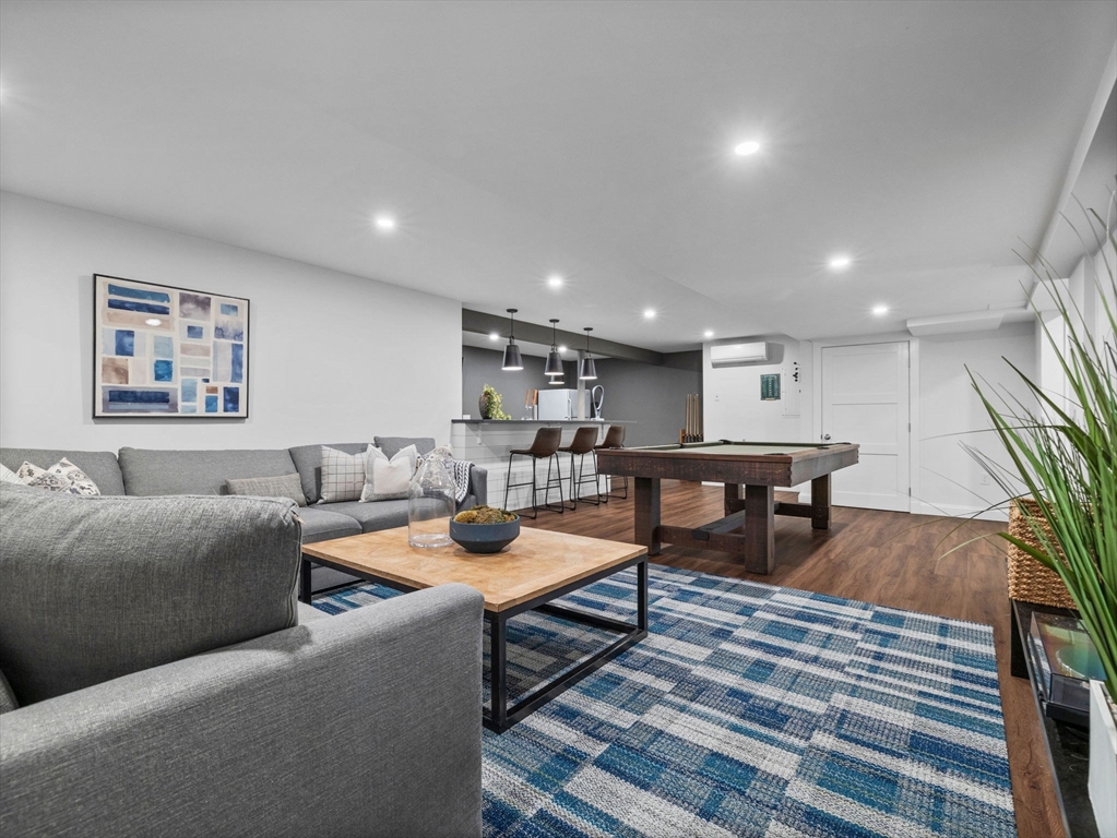 50 Temple Road Wellesley, MA 02482 - Photo 31 of 37 a living room with furniture and a wooden floor