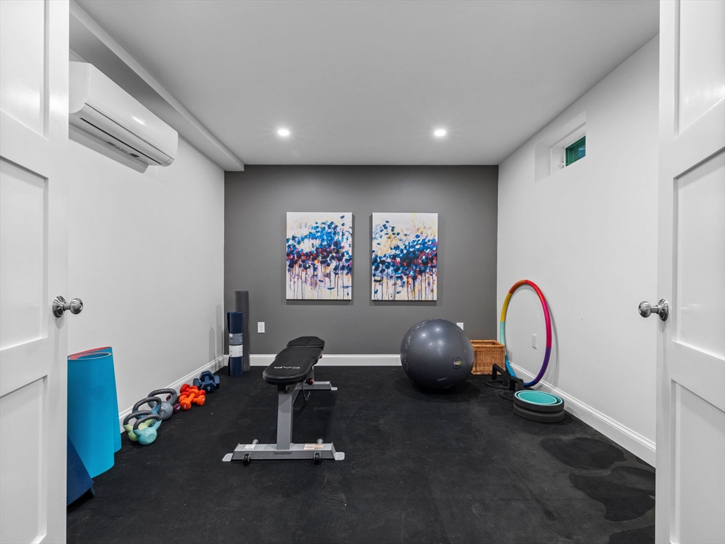 50 Temple Road Wellesley, MA 02482 - Photo 34 of 37 a room with gym equipment