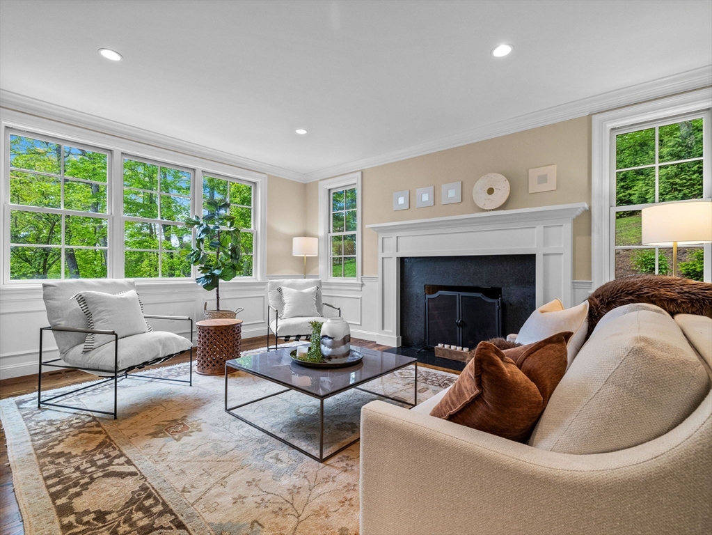 50 Temple Road Wellesley, MA 02482 - Photo 5 of 37 a living room with furniture and a fireplace