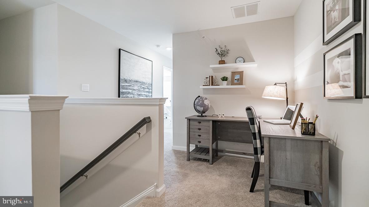 207 Bash Road Toms River, NJ 08753 - Photo 16 of 21 a view of a workspace with furniture and a window
